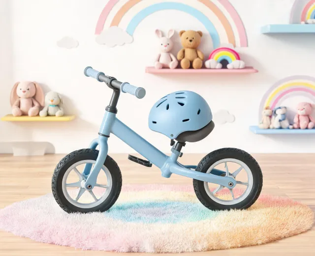 Balance bike on a playroom wall